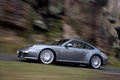 Porsche 997 Carrera 4 MkII anthracite profil travelling penché