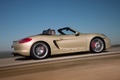 Porsche Boxster S 981 jaune profil travelling penché