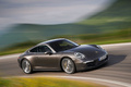 Porsche Carrera 4S - marron - 3/4 avant droit, dynamique