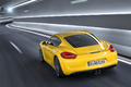 Porsche Cayman 981 jaune 3/4 arrière gauche filé
