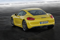 Porsche Cayman S 981 jaune 3/4 arrière gauche penché